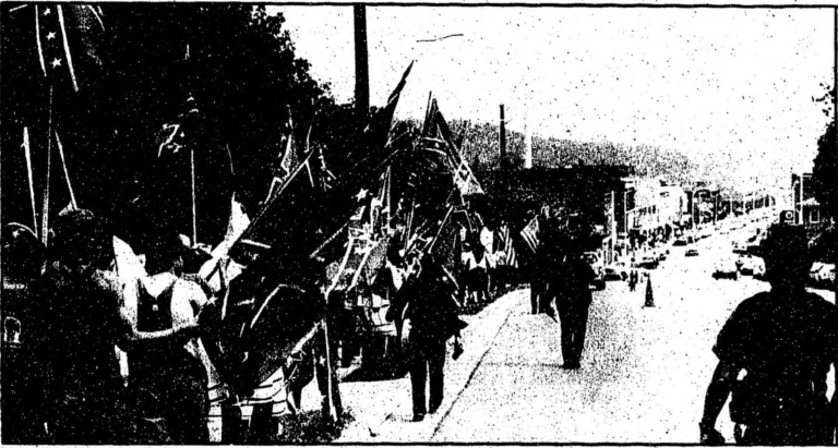 The Knights of the Ku Klux Klan march through Radford. / The Southwest Times, September 21, 1986.